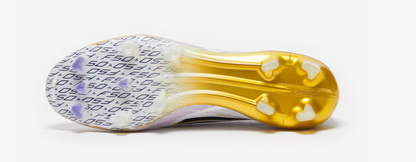 Gold and white sneaker with unique design on a white background