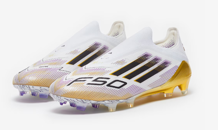 White soccer cleats with gold accents and 'F50' branding on a white background